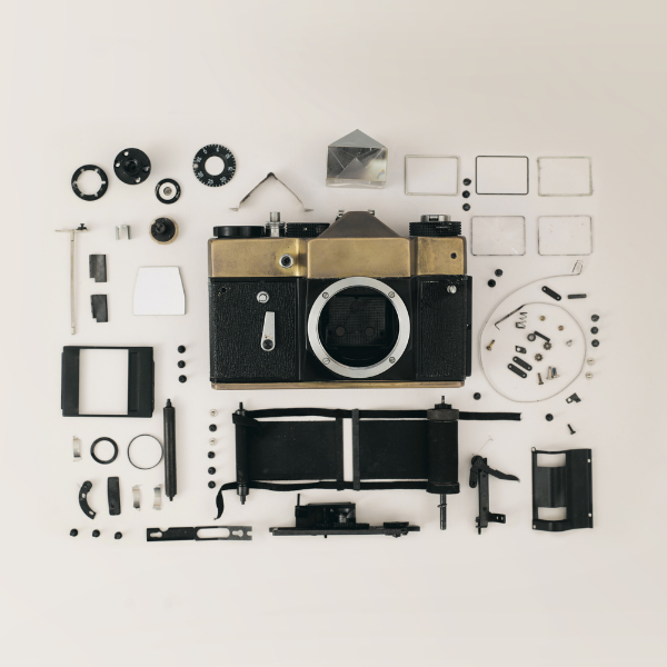 Exploded lay flat slr camera - ready for repair